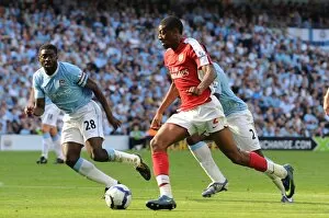Images Dated 12th September 2009: Abou Diaby (Arsenal) Kolo Toure (Man City)