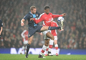 Arsenal v West Ham United 2009-10 Collection: Abou Diaby (Arsenal) Matthew Upson (West Ham). Arsenal 2: 0 West Ham United