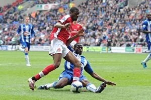 Images Dated 18th April 2010: Abou Diaby (Arsenal) Maynor Figueroa (Wigan). Wigan Athletic 3: 2 Arsenal