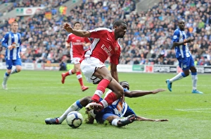 Images Dated 18th April 2010: Abou Diaby (Arsenal) Maynor Figueroa (Wigan). Wigan Athletic 3: 2 Arsenal