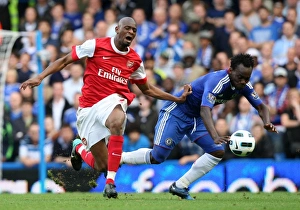 Chelsea v Arsenal 2010-11 Collection: Abou Diaby (Arsenal) Michael Essein (Chelsea). Chelsea 2: 0 Arsenal. Barclays Premier League