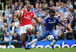 Chelsea v Arsenal 2010-11 Collection: Abou Diaby (Arsenal) Michael Essien (Chelsea). Chelsea 2: 0 Arsenal. Barclays Premier League
