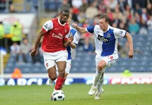 Images Dated 28th August 2010: Abou Diaby (Arsenal) Morten Phil Jones (Blackburn). Blackburn Rovers 1: 2 Arsenal