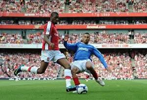 Abou Diaby (Arsenal) Nadir Belhadj (Portsmouth)