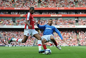 Abou Diaby (Arsenal) Nadir Belhadj (Portsmouth)