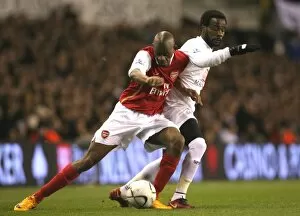 Tottenham v Arsenal Carling Cup Collection: Abou Diaby (Arsenal) Pascal Chimbonda (Tottenham)