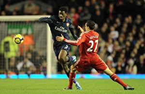 Liverpool v Arsenal 2009-10 Gallery: Abou Diaby (Arsenal) Philipp Degen (Liverpool). Liverpool 1: 2 Arsenal, Barclays Premier League