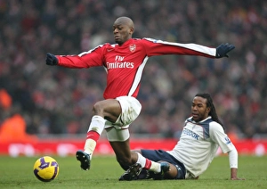 Arsenal v Bolton Wanderers 2008-09 Collection: Abou Diaby (Arsenal) Ricardo Gardner (Bolton)