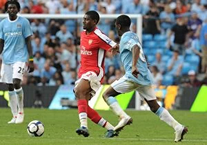 Manchester City v Arsenal 2009-10 Collection: Abou Diaby (Arsenal) Shaun Wright Phillips (Man City)