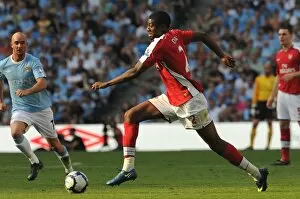Images Dated 12th September 2009: Abou Diaby (Arsenal) Stephen Ireland (Man City)