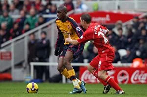 Images Dated 13th December 2008: Abou Diaby (Arsenal) Tony McMahon (Middlesbrough)