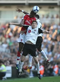 Fulham v Arsenal 2009-10 Collection: Abou Diaby (Arsenal) Zoltan Gera and John Pantsil (Fulham)