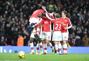 Images Dated 19th December 2009: Abou Diaby celebrates scoring the 3rd Arsenal goal with Theo Walcott, Emmanuel Eboue