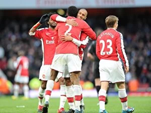 Arsenal v Aston Villa 2009-10 Collection: Abou Diaby celebrates scoring the 3rd Arsenal goal with Armand Traore, Alex Song