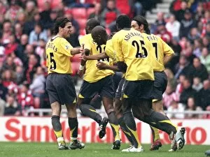 Sunderland v Arsenal 2005-06 Collection: Abou Diaby is congratulated by Cesc Fabregas and Emmanuel Adebayor for pressuring Danny Collins