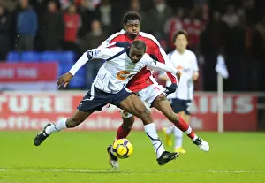 Abou Diaby and Fabrice Muamba Clash: Arsenal's Victory Over Bolton Wanderers in the Premier League