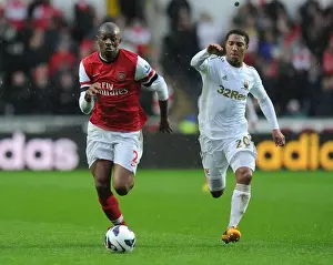 Swansea City V Arsenal 2012-13 Prints: Abou Diaby Outmaneuvers Jonathan de Guzman: Swansea City vs