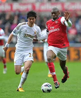 Abou Diaby Outmaneuvers Ki Sung-Yueng: A Premier League Battle