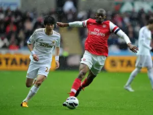 Swansea City V Arsenal 2012-13 Prints: Abou Diaby Outmaneuvers Ki Sung-Yueng: Premier League Battle at Swansea City, 2012-13