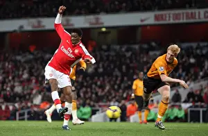 Abou Diaby scores Arsenals 3rd goal under pressure from Paul McShane (Hull)