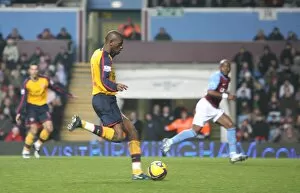 Images Dated 26th December 2008: Abou Diaby shoots past Aston Villa goalkeeper Brad