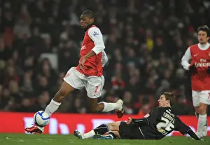 Abou Diaby and Thomas Carroll Clash in Arsenal's 5-0 FA Cup Victory over Leyton Orient