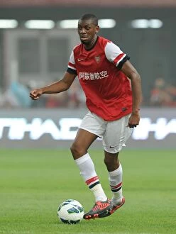 Images Dated 27th July 2012: Abou Diaby vs Manchester City: Arsenal's Pre-Season Defeat at Birds Nest Stadium, Beijing (2012)