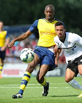 Abou Diaby vs. Sam Cox: A Battle in Arsenal's Pre-Season Clash Against Boreham Wood