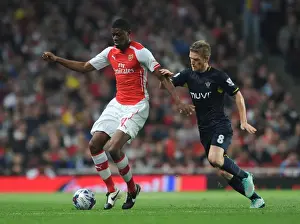 Arsenal V Southampton, League Cup 2014/15 Prints: Abou Diaby vs. Steven Davis: Battle in the Capital One Cup between Arsenal and Southampton
