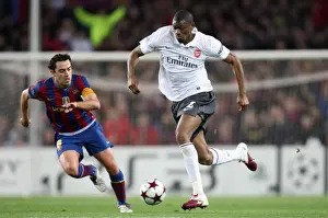 Barcelona V Arsenal 2009-10 Prints: Abou Diaby vs Xavi: Barcelona's Dominance Over Arsenal in the 2010 UEFA Champions League Quarterfinals