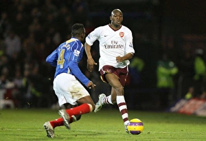 Portsmouth v Arsenal Gallery: Abu Diaby (Arsenal) Lauren (Portsmouth)