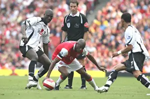Abu Diaby (Arsenal) Papa Boupa Diop and Liam Rosenior (Fulham)