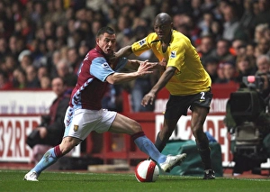 Images Dated 15th March 2007: Abu Diaby (Arsenal) Phil Bardsley (Aston Villa)