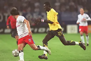 Adebayor's Double: Hamburg's 1-2 Defeat to Arsenal in Champions League Group G