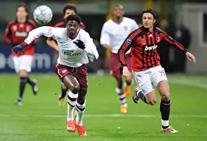 Adebayor's Double Strikes: Arsenal Overpowers AC Milan 2-0 in Champions League Showdown (Oddo, Milan)