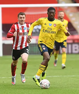 Ainsley Maitland-Niles in Action: Arsenal's FA Cup Quarterfinal Battle against Sheffield United