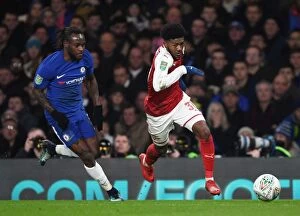 Chelsea v Arsenal - Carabao Cup 1/2 final 1st leg 2017-18 Collection: Ainsley Maitland-Niles vs Victor Moses: Carabao Cup Semi-Final Showdown (Chelsea v Arsenal)