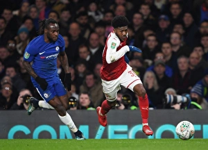 Chelsea V Arsenal - Carabao Cup 1/2 Final 1st Leg 2017-18 Prints: Ainsley Maitland-Niles vs Victor Moses: Carabao Cup Semi-Final Showdown (Chelsea v Arsenal)