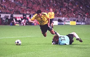 Ajax goalkeeper Hans Vonk trips Jose Reyes for the Arsenal penalty