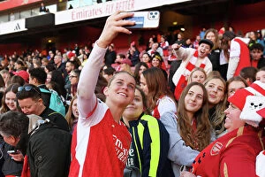 Images Dated 15th October 2023: Alessia Russo's Triumph: Arsenal Fans Celebrate Victory over Aston Villa