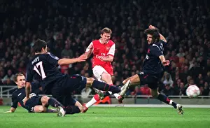 Alex Helb scores Arsenals 4th, past Matej Krajcik and Marek Suchy (Slavia)