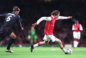 Arsenal v CSKA Moscow 2006-07 Collection: Alex Hleb (Arsenal) Aleksei Berezutskiy (CSKA)