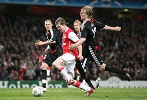 Images Dated 4th April 2008: Alex Hleb (Arsenal) is fouled by Dirk Kuyt but a penalty isn t given