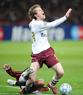 AC Milan V Arsenal 2007-8 Prints: Alex Hleb (Arsenal) is fouled by Massimo Oddo (AC Milan)