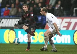 Images Dated 31st March 2008: Alex Hleb (Arsenal) Gavin McCann (Bolton)