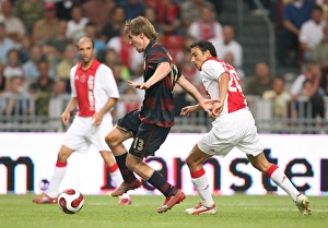 Ajax v Arsenal 2007-8 Gallery: Alex Hleb (Arsenal) George Ogararu (Ajax)