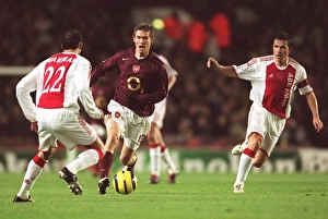 Arsenal v Ajax 2005-6 Collection: Alex Hleb (Arsenal) Juanfran (Ajax). Arsenal 0: 0 Ajax
