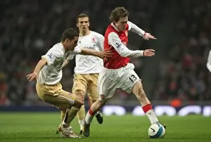 Images Dated 17th March 2008: Alex Hleb (Arsenal) Luke Young (Middlesbrough)