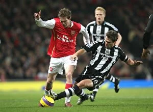 Arsenal v Newcastle United 2007-8 League Collection: Alex Hleb (Arsenal) Michael Owen (Newcastle United)