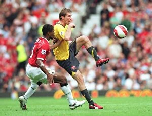 Manchester United v Arsenal 2006-7 Collection: Alex Hleb (Arsenal) Patrice Evra (Manchester United)